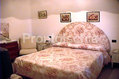 Residence Villa Cristina - Una camera matrimoniale